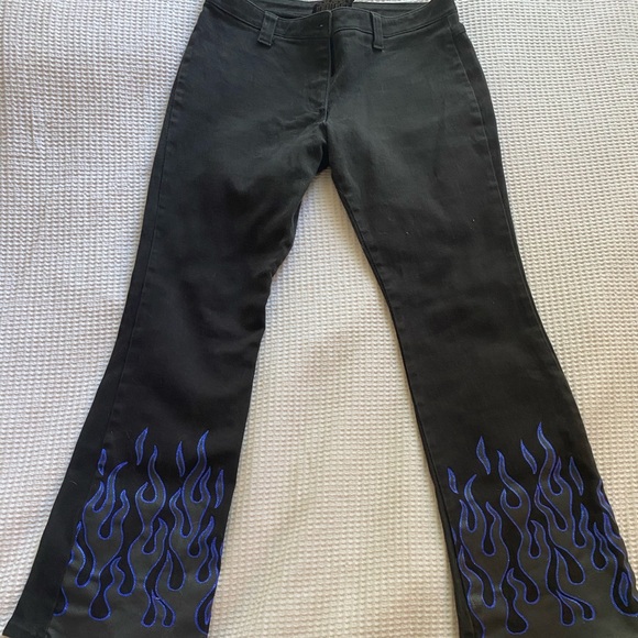 Vintage 90’s black flare jeans with blue flames